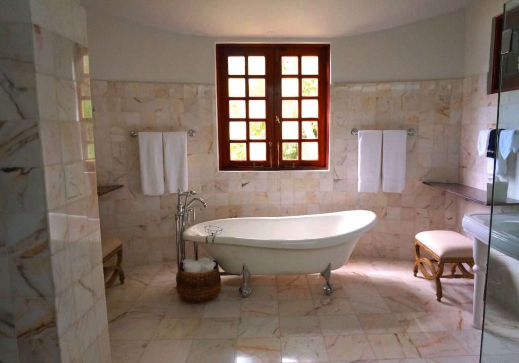 It is important to control the condensation in the bathroom, a hygrometer is what you need